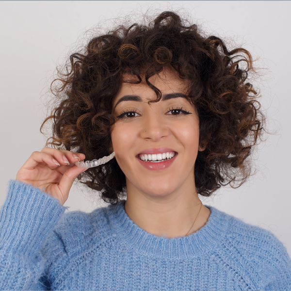 Invisalign treatment is a nearly invisible way to get your brightest smile, in the hands of experienced doctors, who prescribe each individual tooth movement.